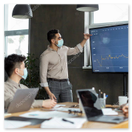 Guests receiving a safety briefing beside the convertibles